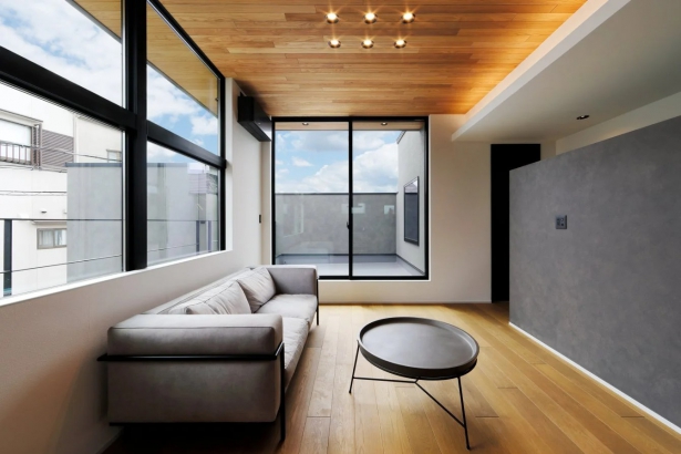 リビング es ARCHITECT株式会社の施工事例 デザインと暮らしやすさを追求した、 2階リビングの家