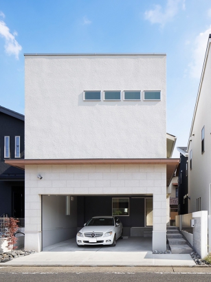 シンプルなフォルムの外観 三井ホーム株式会社の施工事例 シンプルなデザインに質感豊かな素材が映える家